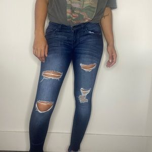 Dark washed distressed skinny jean